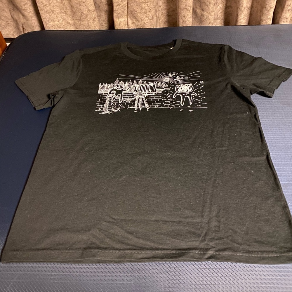 Black Radiohead merch T shirt.